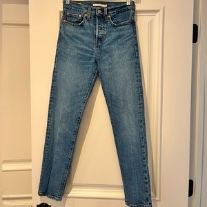 Levi jeans medium wash, size 24 straight leg.